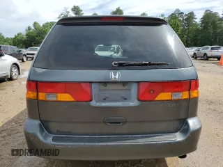 2003 Honda Odyssey EX-L with VIN 5FNRL18933B116127, listed as a Copart auction lot 56013645 with 157,118 mi miles and Salvage Title. Bid and sale history available at DreamBid. Image 6.