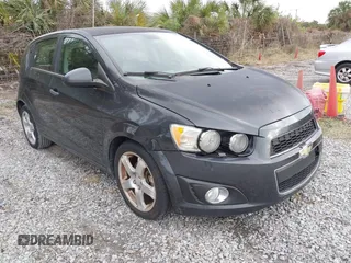 2016 Chevrolet Sonic LTZ z VIN 1G1JE6SB6G4153761, wystawiony jako IAAI lot #41378241 z przebiegiem 150 209 mil mil oraz . Historia ofert i sprzedaży dostępna na DreamBid. Obrazek 1.