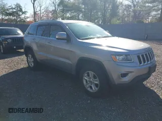 2014 Jeep Grand Cherokee Laredo with VIN 1C4RJFAG4EC262337, listed as a IAAI auction lot 42078923 with 203,894 mi miles. Bid and sale history available at carsss.com. Image 1.
