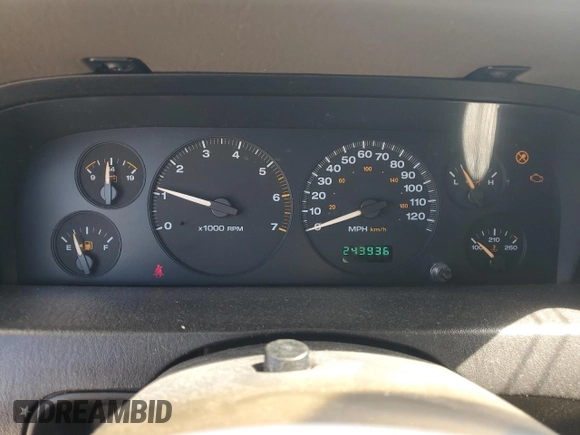 2003 Jeep Grand Cherokee Laredo with VIN 1J4GW48S23C524693, listed as a Copart auction lot 64461755 with 243,936 mi miles and Salvage title. Bid and sale history available at DreamBid. Image 9.