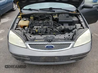 2005 Ford Focus S with VIN 3FAFP37N75R120187, listed as a Copart auction lot 57390605 with 163,547 mi miles and Salvage title. Bid and sale history available at DreamBid. Image 11.