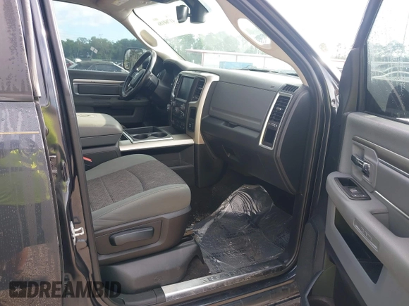 2015 Ram 1500 Big Horn z VIN 1C6RR7TM8FS711048, wystawiony jako IAAI lot #41760186 z przebiegiem Nie podano mil oraz . Historia ofert i sprzedaży dostępna na DreamBid. Obrazek 5.