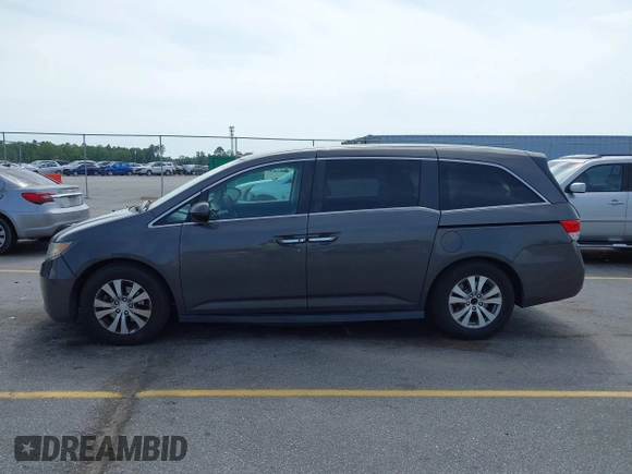 2015 Honda Odyssey EX z VIN 5FNRL5H41FB059667, wystawiony jako IAAI lot #42274039 z przebiegiem 196 687 mil mil oraz . Historia ofert i sprzedaży dostępna na DreamBid. Obrazek 14.