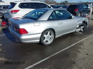 1999 Mercedes-Benz SL-Class with VIN WDBFA68F6XF181288, listed as a IAAI auction lot 41687202 with 63,259 mi miles. Bid and sale history available at carsss.com. Image 4.