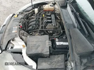 2014 Ford Focus Titanium z VIN 1FADP3N23EL402874, wystawiony jako IAAI lot #43397973 z przebiegiem 153 283 mil mil oraz . Historia ofert i sprzedaży dostępna na DreamBid. Obrazek 19.