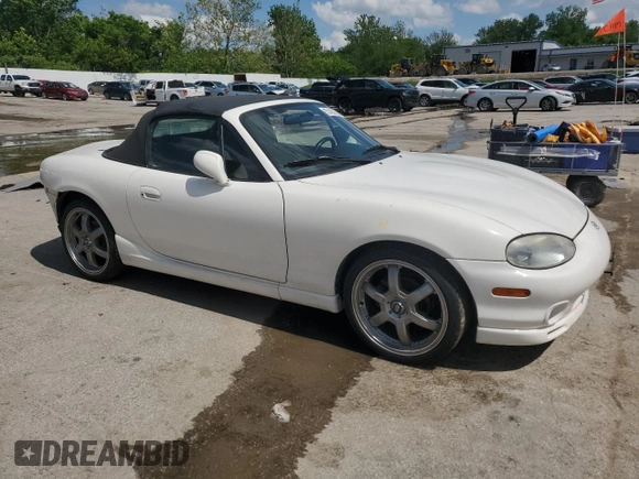 2000 Mazda MX-5 Miata with VIN JM1NB3531Y0152594, listed as a Copart auction lot 57460195 with 78,139 mi miles and Salvage title. Bid and sale history available at DreamBid. Image 4.