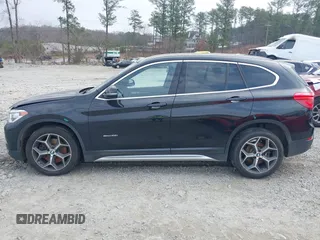 2017 BMW X1 sDrive28i with VIN WBXHU7C36HP924874, listed as a IAAI auction lot 41368396 with 113,443 mi miles. Bid and sale history available at carsss.com. Image 13.