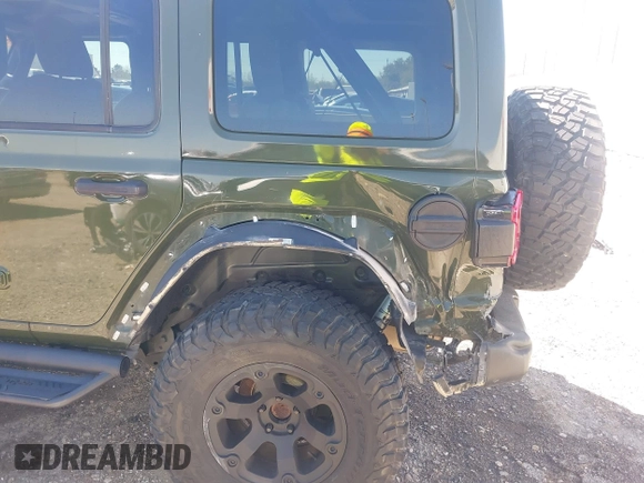 2020 Jeep Wrangler Unlimited Sahara High Altitude with VIN 1C4HJXEG8LW283103, listed as a IAAI auction lot 41830769 with 39,447 mi miles and . Bid and sale history available at DreamBid. Image 17.