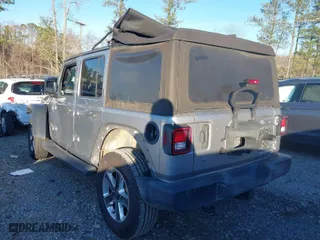 2018 Jeep Wrangler Unlimited Sport S with VIN 1C4HJXDG0JW158935, listed as a IAAI auction lot 41187384 with 69,721 mi miles. Bid and sale history available at carsss.com. Image 3.