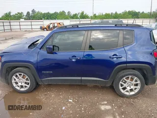 2021 Jeep Renegade Latitude with VIN ZACNJCBB8MPM36868, listed as a IAAI auction lot 42123253 with 52,760 mi miles and . Bid and sale history available at DreamBid. Image 14.