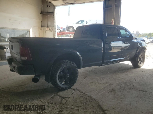 2014 Ram 3500 Laramie with VIN 3C63R3JL9EG258069, listed as a Copart auction lot 71571664 with 104,983 mi miles and Salvage Title. Bid and sale history available at carsss.com. Image 3.