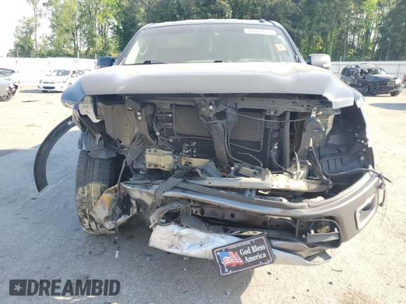 2017 Nissan Titan Platinum Reserve with VIN 1N6AA1E53HN569660, listed as a Copart auction lot 54409625 with 98,858 mi miles and Salvage title. Bid and sale history available at DreamBid. Image 5.