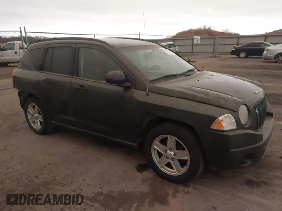 2007 Jeep Compass Sport with VIN 1J8FT47W77D221755, listed as a IAAI auction lot 41826458 with 205,072 mi miles. Bid and sale history available at carsss.com. Image 1.