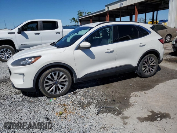 2021 Ford Escape Titanium Hybrid z VIN 1FMCU0DZ5MUB04522, wystawiony jako Copart lot #49127385 z przebiegiem 66 996 mil mil oraz Szkody całkowita. Historia ofert i sprzedaży dostępna na DreamBid. Obrazek 1.