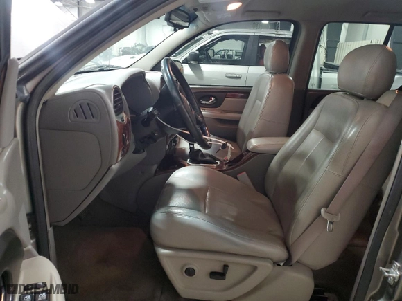 2005 GMC Envoy SLE with VIN 1GKDS13S252229262, listed as a Copart auction lot 51214685 with 117,256 mi miles and Salvage Title. Bid and sale history available at carsss.com. Image 7.