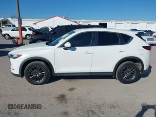 2020 Mazda CX-5 Touring with VIN JM3KFACM6L0737727, listed as a IAAI auction lot 41283200 with 85,949 mi miles and . Bid and sale history available at carsss.com. Image 14.