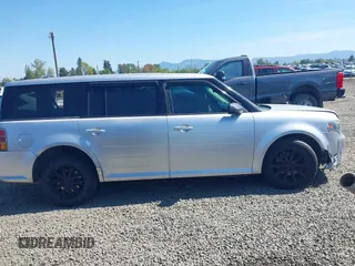 2014 Ford Flex SE z VIN 2FMGK5B85EBD33594, wystawiony jako IAAI lot #42015065 z przebiegiem 171 178 mil mil oraz . Historia ofert i sprzedaży dostępna na DreamBid. Obrazek 13.