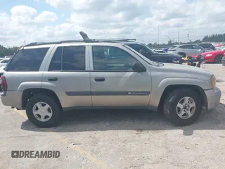 2003 Chevrolet TrailBlazer LS with VIN 1GNDT13SX32367807, listed as a IAAI auction lot 42070031 with 162,966 mi miles and . Bid and sale history available at DreamBid. Image 13.