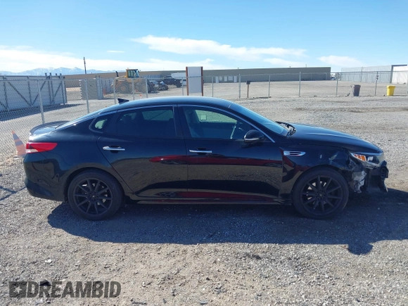 2016 Kia Optima LX with VIN 5XXGT4L32GG108695, listed as a IAAI auction lot 41647970 with 125,319 mi miles. Bid and sale history available at carsss.com. Image 13.