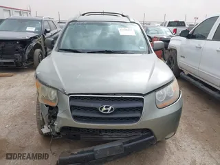 2009 Hyundai Santa Fe SE with VIN 5NMSH13E39H297907, listed as a IAAI auction lot 41708199 with 203,771 mi miles. Bid and sale history available at carsss.com. Image 12.