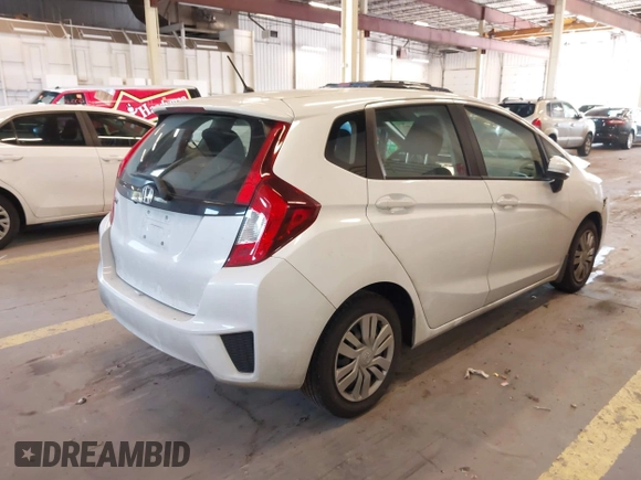 2015 Honda Fit LX with VIN 3HGGK5H57FM106670, listed as a IAAI auction lot 42097655 with 116,303 mi miles and . Bid and sale history available at DreamBid. Image 4.