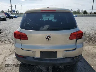 2012 Volkswagen Tiguan SE z VIN WVGAV7AX0CW509206, wystawiony jako Copart lot #52226395 z przebiegiem 108 922 mil mil oraz Szkody całkowita. Historia ofert i sprzedaży dostępna na DreamBid. Obrazek 6.