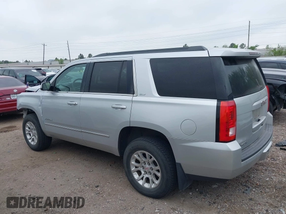 2015 GMC Yukon SLT z VIN 1GKS1BKC0FR172661, wystawiony jako IAAI lot #41911331 z przebiegiem 171 815 mil mil oraz . Historia ofert i sprzedaży dostępna na DreamBid. Obrazek 15.