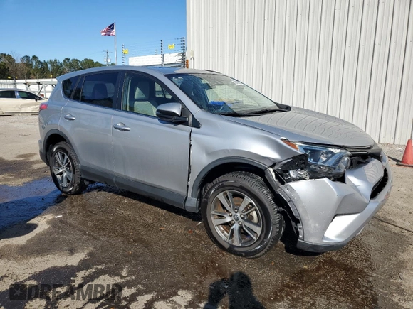 2018 Toyota RAV4 XLE with VIN JTMWFREV1JJ205906, listed as a Copart auction lot 84700564 with 64,953 mi miles and Salvage Title. Bid and sale history available at DreamBid. Image 4.