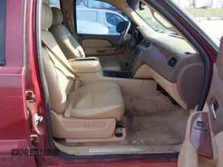 2007 GMC Yukon SLE with VIN 1GKFK13077J204048, listed as a IAAI auction lot 42052206 with 273,197 mi miles. Bid and sale history available at carsss.com. Image 5.