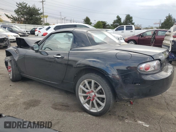 2008 Mazda MX-5 Miata Touring with VIN JM1NC26F080154207, listed as a Copart auction lot 76906044 with 169,602 mi miles and Salvage title. Bid and sale history available at DreamBid. Image 2.