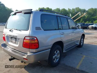 2001 Toyota Land Cruiser z VIN JTEHT05J912007249, wystawiony jako IAAI lot #42409963 z przebiegiem 303 292 mil mil oraz . Historia ofert i sprzedaży dostępna na DreamBid. Obrazek 4.