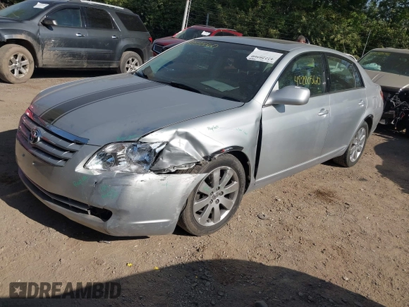 2005 Toyota Avalon XL z VIN 4T1BK36B95U050498, wystawiony jako IAAI lot #42220560 z przebiegiem 140 222 mil mil oraz . Historia ofert i sprzedaży dostępna na DreamBid. Obrazek 17.