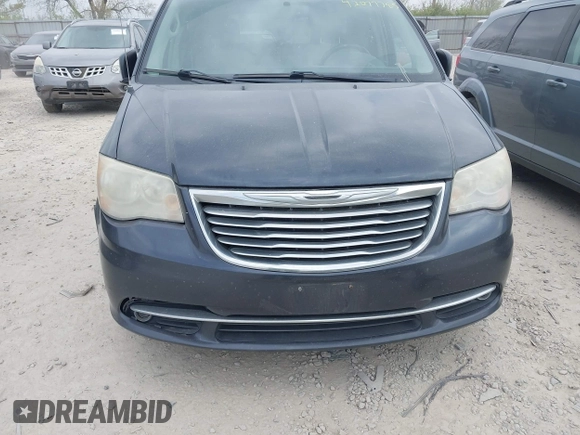2013 Chrysler Town & Country Touring with VIN 2C4RC1BG4DR595154, listed as a IAAI auction lot 42077785 with 169,474 mi miles. Bid and sale history available at carsss.com. Image 6.