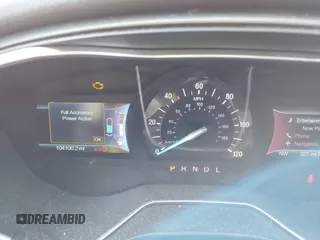 2015 Ford Fusion Energi Titanium with VIN 3FA6P0SU0FR200963, listed as a IAAI auction lot 41897182 with 104,100 mi miles. Bid and sale history available at carsss.com. Image 7.