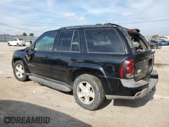 2003 Chevrolet TrailBlazer LTZ with VIN 1GNDT13S332196883, listed as a Copart auction lot 77031124 with 167,328 mi miles and Salvage Title. Bid and sale history available at DreamBid. Image 2.