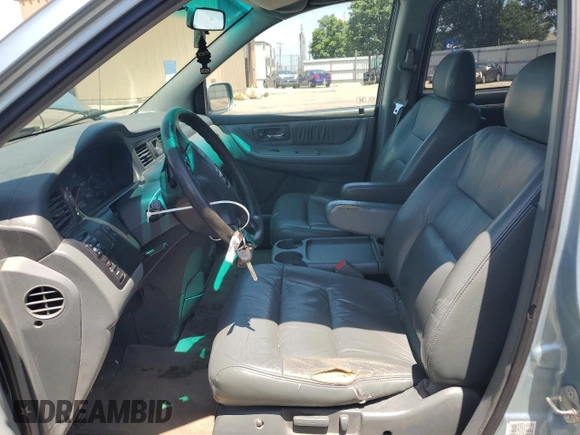 2004 Honda Odyssey EX-L with VIN 5FNRL18014B015462, listed as a Copart auction lot 62834665 with 323,817 mi miles and Salvage title. Bid and sale history available at DreamBid. Image 7.