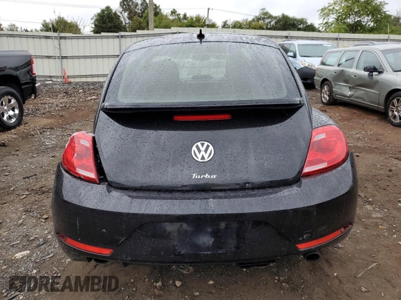 2014 Volkswagen Beetle Turbo R-Line with VIN 3VWVT7AT2EM603435, listed as a Copart auction lot 72755524 with 99,300 mi miles and Salvage Title. Bid and sale history available at DreamBid. Image 6.