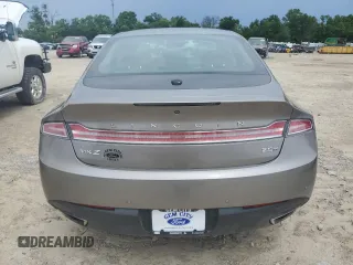 2015 Lincoln MKZ Hybrid z VIN 3LN6L2LU4FR625940, wystawiony jako Copart lot #61721025 z przebiegiem 56 151 mil mil oraz Szkoda całkowita • Salvage title. Historia ofert i sprzedaży dostępna na DreamBid. Obrazek 6.