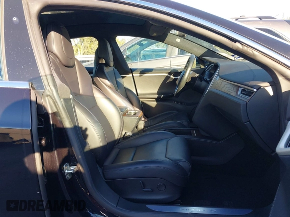 2017 Tesla Model S 60 with VIN 5YJSA1E19HF226094, listed as a IAAI auction lot 40931307 with 80,392 mi miles and . Bid and sale history available at DreamBid. Image 5.