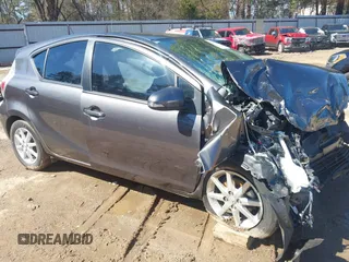 2014 Toyota Prius One with VIN JTDKDTB32E1561856, listed as a IAAI auction lot 41591107 with 104,363 mi miles and . Bid and sale history available at DreamBid. Image 1.