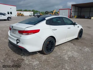 2016 Kia Optima EX with VIN 5XXGU4L38GG013197, listed as a IAAI auction lot 42125301 with 110,128 mi miles. Bid and sale history available at carsss.com. Image 4.
