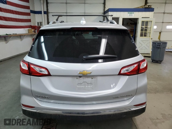 2020 Chevrolet Equinox Premier z VIN 2GNAXXEV3L6128099, wystawiony jako Copart lot #79041114 z przebiegiem 65 856 mil mil oraz Szkoda całkowita • Salvage title. Historia ofert i sprzedaży dostępna na DreamBid. Obrazek 6.