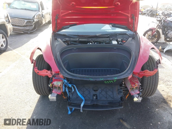 2023 Tesla Model 3 with VIN 5YJ3E1EA9PF695547, listed as a IAAI auction lot 40100334 with Not Provided miles and . Bid and sale history available at DreamBid. Image 6.