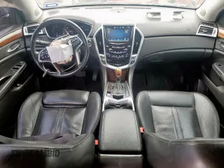 2013 Cadillac SRX Premium Collection с VIN 3GYFNJE39DS650569, выставлен на аукционе Copart как лот 59947905 с пробегом 146 548 миль миль и Списание • Salvage title. История ставок и продаж доступна на DreamBid. Изображение 8.