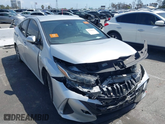 2021 Toyota Prius LE with VIN JTDKAMFP1M3180370, listed as a IAAI auction lot 41928512 with 83,249 mi miles and . Bid and sale history available at DreamBid. Image 1.