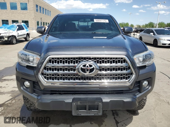 2017 Toyota Tacoma SR5 z VIN 3TMCZ5AN6HM060416, wystawiony jako Copart lot #56697175 z przebiegiem 120 029 mil mil oraz Szkoda całkowita • Salvage title. Historia ofert i sprzedaży dostępna na DreamBid. Obrazek 5.