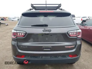 2019 Jeep Compass Trailhawk with VIN 3C4NJDDB1KT739938, listed as a IAAI auction lot 41411173 with 140,396 mi miles and . Bid and sale history available at carsss.com. Image 16.