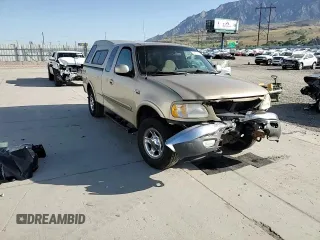 1999 Ford F-150 XL with VIN 1FTRX18L5XKA44484, listed as a Copart auction lot 56232815 with 177,990 mi miles and Salvage title. Bid and sale history available at DreamBid. Image 13.