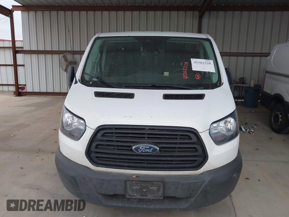 2019 Ford Transit with VIN 1FTYE1ZM2KKB46391, listed as a IAAI auction lot 41362328 with 128,327 mi miles and . Bid and sale history available at carsss.com. Image 12.