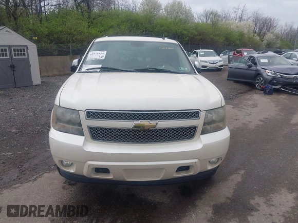 2010 Chevrolet Suburban LTZ with VIN 1GNUKKE35AR129351, listed as a IAAI auction lot 41971625 with 234,487 mi miles. Bid and sale history available at carsss.com. Image 12.